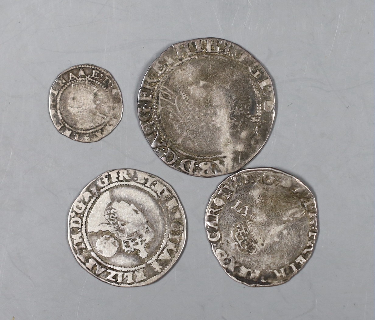 British coins, Elizabeth I shilling, sixpence and threepence and a James I shilling.